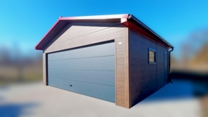 6x5,8m-es DELUX szigetelt mobilgarázs, nyeregtetővel, sötét diófa falakkal, antracitszürke szekcionált kapuval és ajtóval, szegélyekkel, ereszcsatonával, horganyzott vázszerkezettel